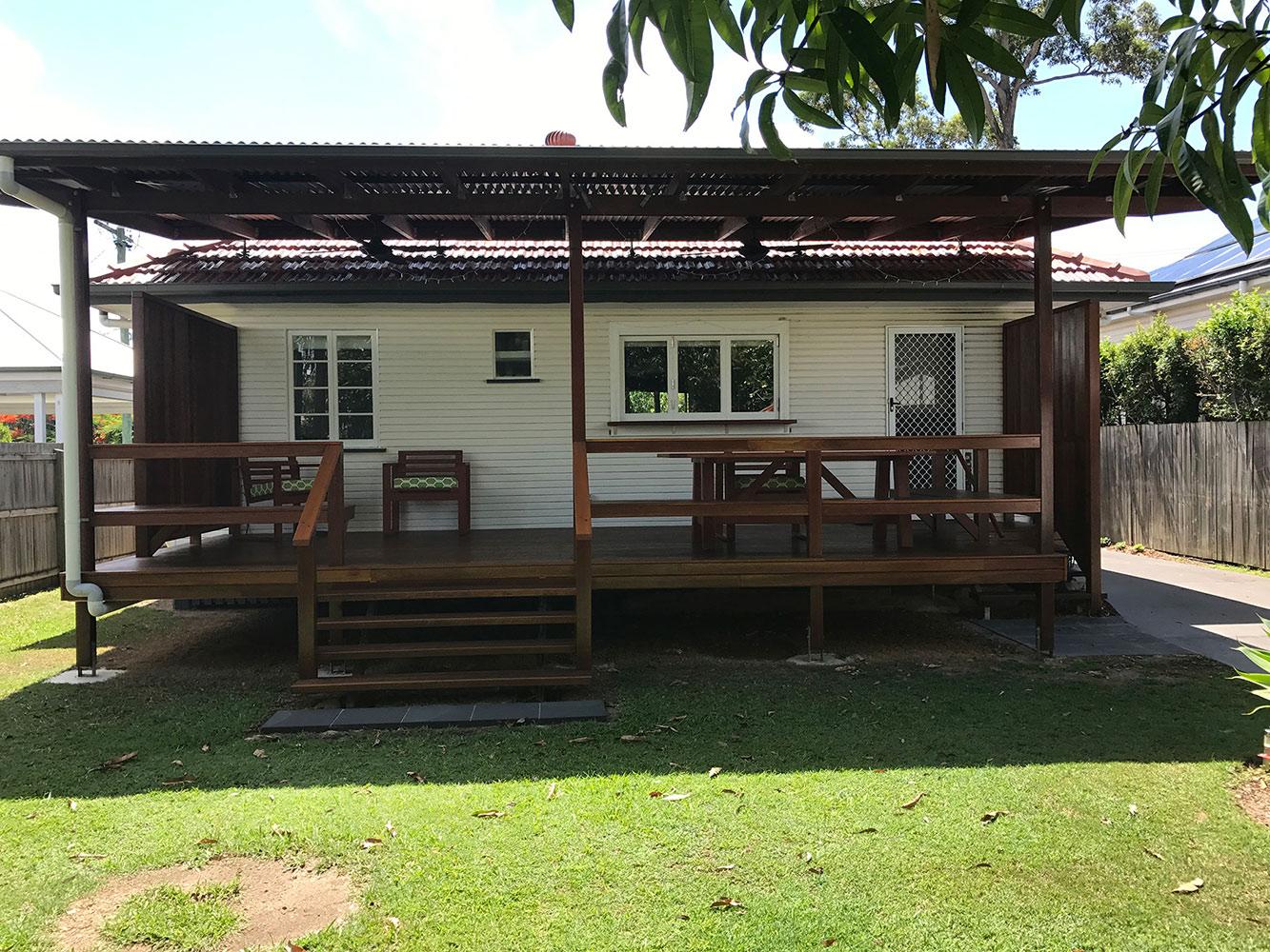 Timber Deck With Pergola Roof And Stairs